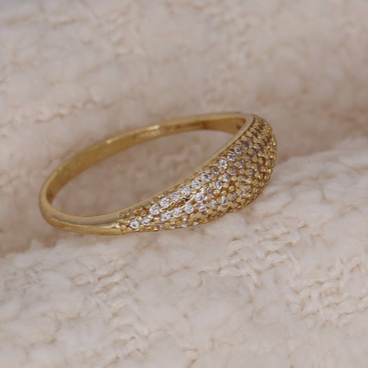 Gold dome pavé ring with cubic zirconia detail